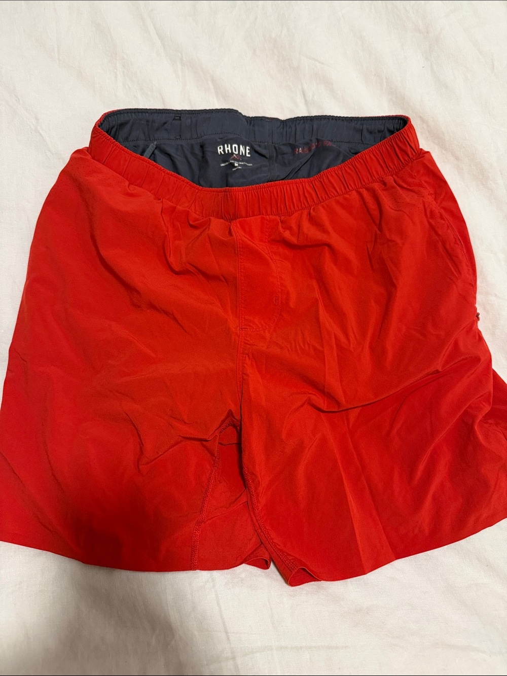 RHONE Bright Red Performance Shorts with Navy Liner